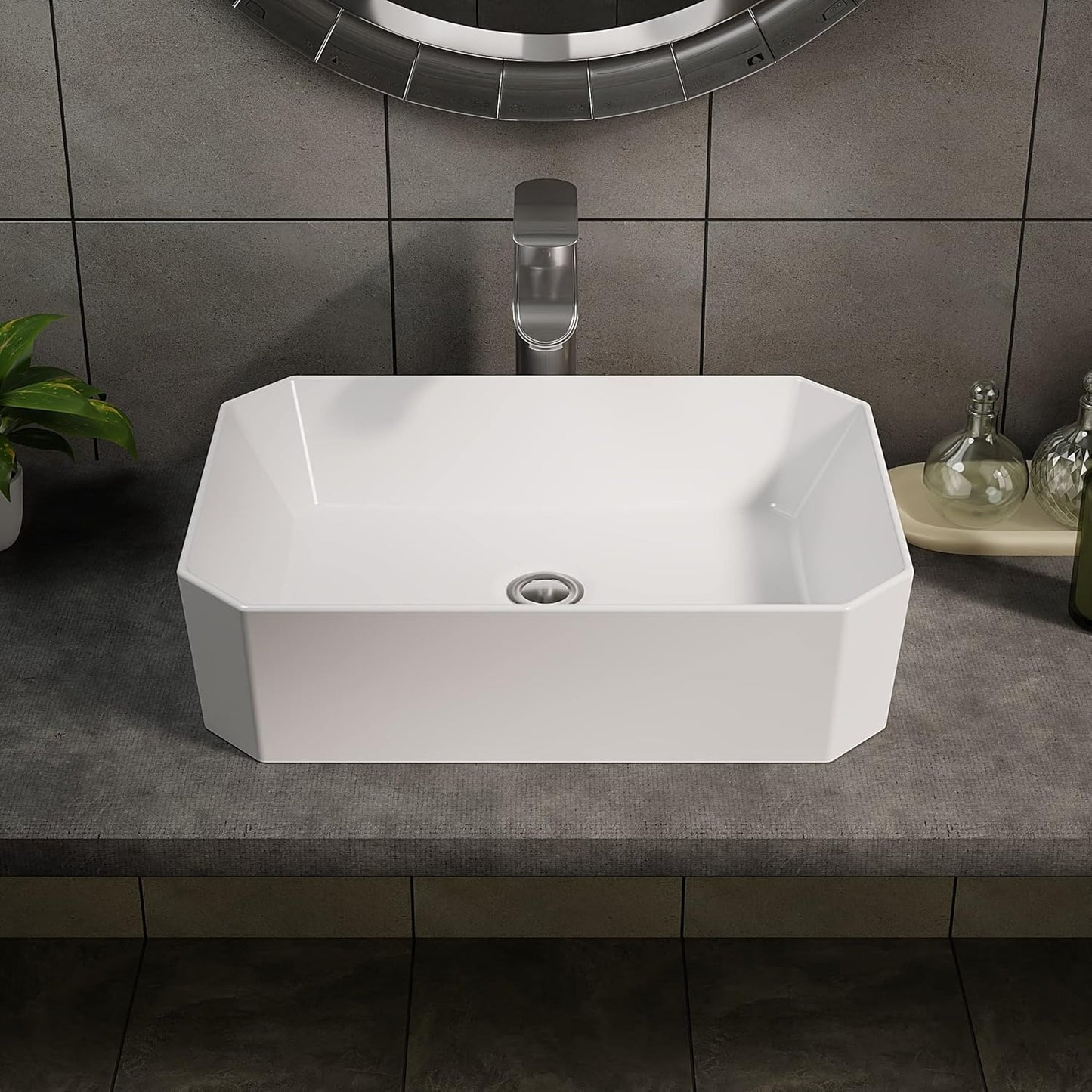 Front view of a sleek white cloakroom basin with geometric edges and a minimalist aesthetic.