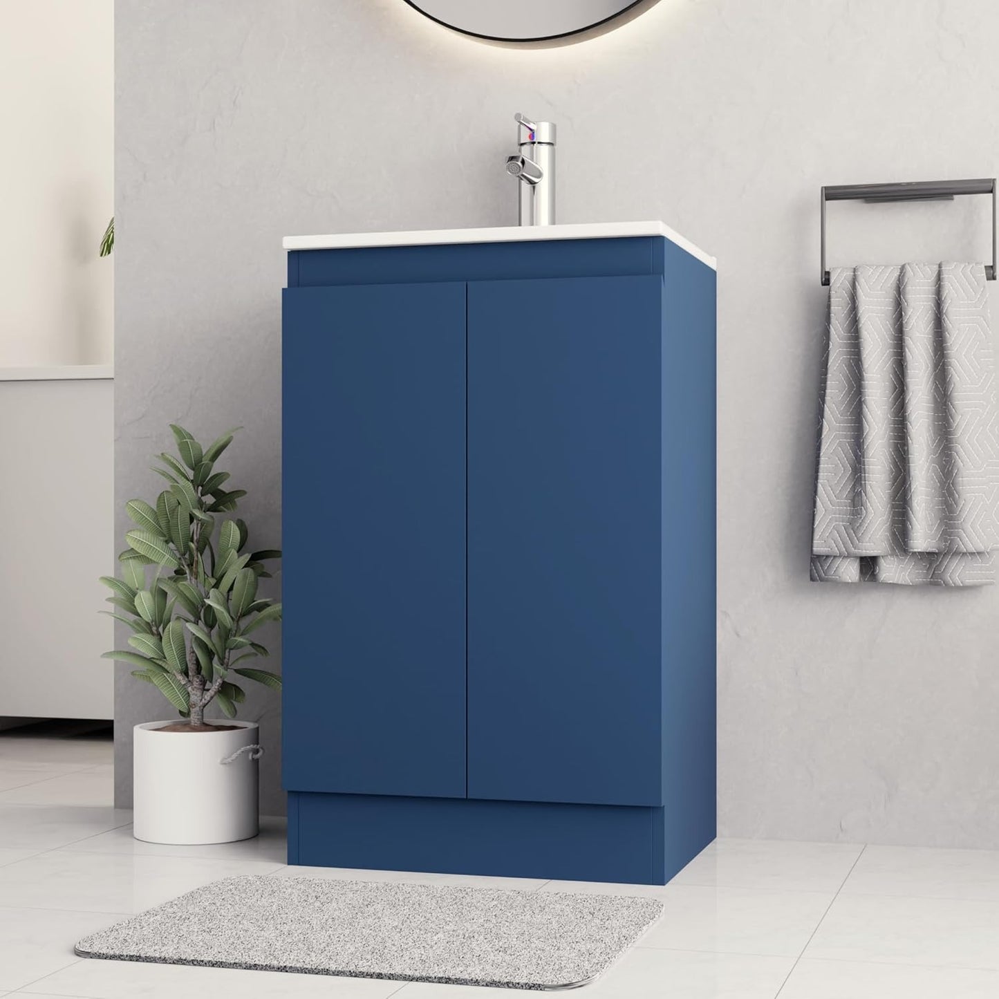 Side view of 500mm navy blue vanity unit with chrome tap and a modern sleek design.