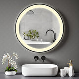 Homelay Stella 500mm Black Framed Round LED Bathroom Mirror with integrated LED lighting, displayed above a modern sink with minimalist decor.