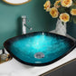 Stylish blue glass countertop basin with a glossy finish, paired with a chrome faucet, next to a decorative flower vase.