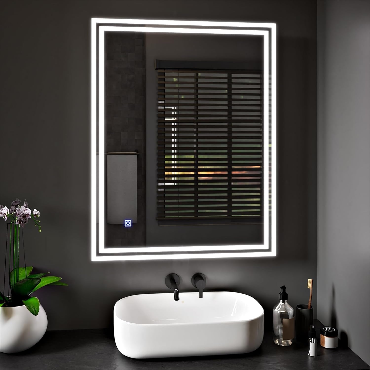 Delta 60x80cm LED bathroom mirror installed above a modern sink with dual LED light strips.