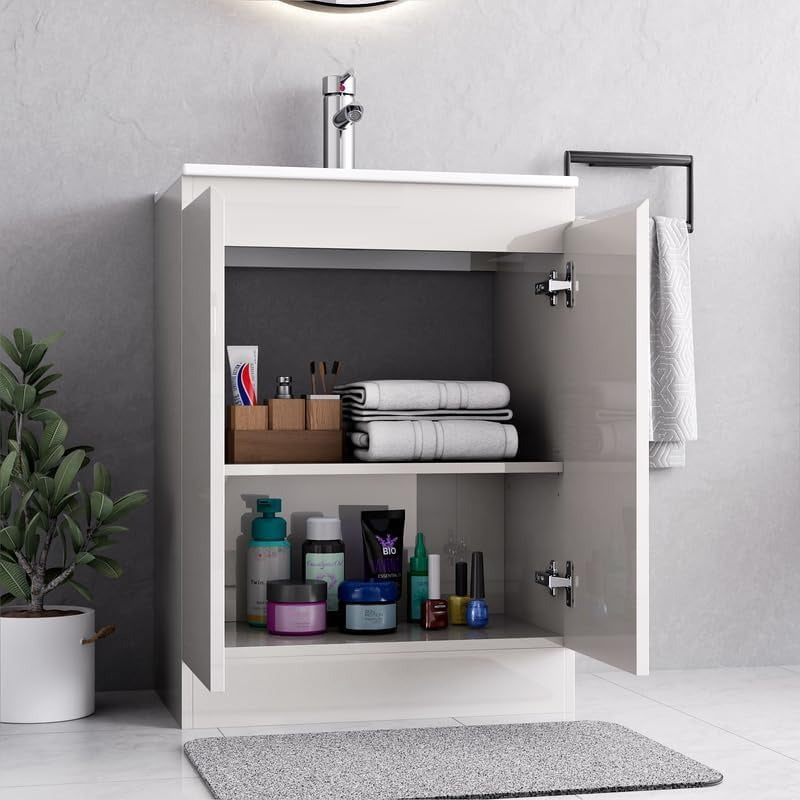 Interior storage of Denver White 500mm Vanity Unit showcasing shelves with towels and toiletries.