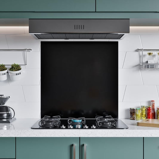 Front view of black stainless steel splashback 60x60cm behind cooker in modern kitchen.