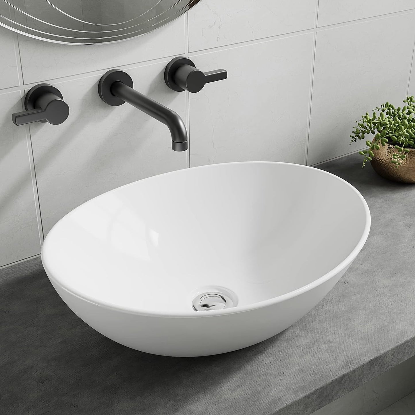 Gloss white oval counter top basin close-up on a grey countertop with black wall tap.