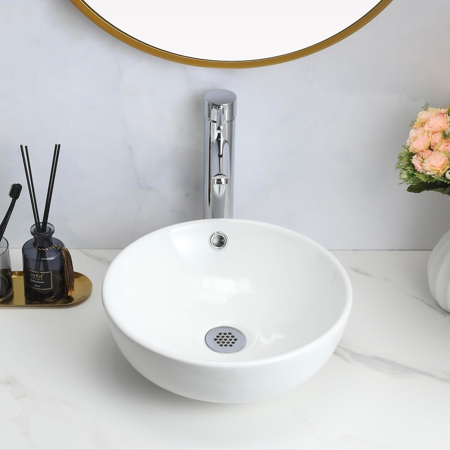 Gloss white round counter top basin with modern tap setup