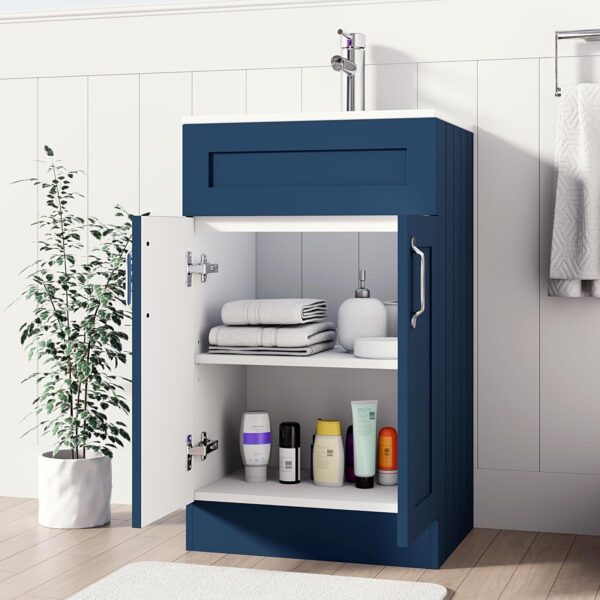 500mm blue vanity unit with open storage, showcasing towels and toiletries neatly arranged.